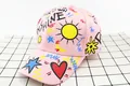 Detailed top view of pink kids baseball cap with colorful sun and heart graffiti art - Kids (3-12 Years) / Pink Sun Shape