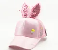 Detailed view of pink mesh kids cap with sequin ears and cute potato fry badge - Pink