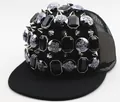 Detailed close-up of hip hop snapback cap featuring silver metal spikes and black gems - Mesh Style / Black Square Rhinestone