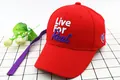 Detail of red cotton baseball cap with Live For Real 3D embroidery and purple long strap - Kids (48-53cm) / Red