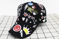 Kids black baseball cap with colorful graffiti print and Be Yourself slogan - Kids (3-12 Years) / Smiley Face Black