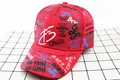 Detail of red kids baseball cap with graffiti print and streetwear slogan embroidery - Kids / FD Red