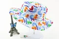 Detail of kids sun hat with colorful dinosaur surfing print and adjustable chin strap - 48CM Circumference (2-4 Years) / White Dinosaur Surfing Style (Fig 3)