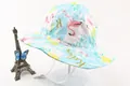 Detail of baby sun hat with flamingo and pineapple prints including windproof strap - Flamingo Pineapple Style (Fig 6)