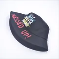 Unisex black canvas bucket hat featuring pink MESSED UP graffiti art and street style print - Adult / Black