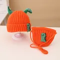Kids orange knitted hat and matching crossbody bag set with cartoon dinosaur elements - Knitted Hat And Crossbody Bag Set / Orange