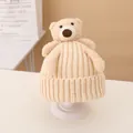 Chic beige knit baby beanie featuring a cute plush bear doll for autumn and winter warmth - Hat / Beige
