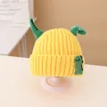 Kids knitted beanie set featuring cute green dinosaur 3D decor in vibrant ginger yellow - Beanie / Yellow