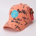 Kids graffiti baseball cap in peach pink with blue Yeah patch and all-over letter print - Children (Approx. 3-10 Years Old) / Orange Pink
