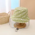 Detail of light green bucket hat featuring white letter print and adjustable chin strap - Kids (Approx. 2-8 Years) / Green