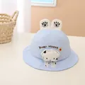 Detail of light blue baby sun hat featuring 3D cartoon bear decor and bear hoase embroidery - Baby (Approx 1-4 Years Old) / Blue Rabbit