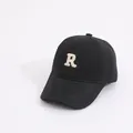Classic black kids baseball cap featuring an off-white embroidered letter R - Kids (Approx. 2-8 Years) / R Letter Black