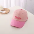 Close-up of pink Smile embroidery on kids' baseball cap with contrasting two-tone panels - Kids (3-10 Years) / Pink and Dark Pink