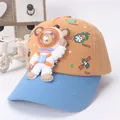 Kids orange and blue baseball cap featuring a 3D astronaut bear and space patterns - Kids Adjustable / Khaki Patchwork Blue