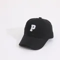 Classic black kids baseball cap featuring a white embroidered letter P on cotton fabric - Kids (Approx. 2-8 Years) / P Letter Black