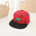 Kids baseball cap featuring red cartoon bear pattern and black flat brim for outdoors - Red