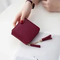 Short square burgundy wallet for women with golden zipper and decorative tassel - Burgundy