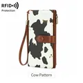 Portefeuille long RFID pour femme avec imprimé motif vache noir et blanc élégant - Imprimé vache