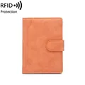 Orange RFID blocking passport wallet with buckle closure and textured finish - Orange