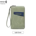 Light green RFID blocking passport holder in matte leather with wrist strap and zipper - Light Green