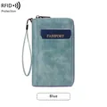 Portefeuille voyage RFID en cuir bleu vintage avec grande capacité et dragonne amovible - Bleu