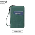 Dark green RFID blocking passport wallet with matte leather finish and hand strap - Dark Green