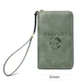Green RFID passport wallet with embossed globe design and zipper closure for travel - Green