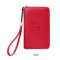 Red RFID blocking passport holder in faux leather with gold zipper and hand strap - Red