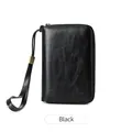 Black RFID blocking passport wallet with zipper closure and wrist strap - Black