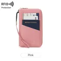 Porte-passeport RFID rose avec fermeture éclair multifonctionnelle et dragonne pratique - Rose