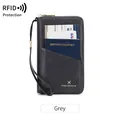 Portefeuille de voyage gris avec protection RFID en cuir texturé et dragonne - Gris