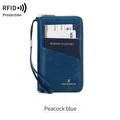 Portefeuille de voyage RFID bleu paon avec fermeture éclair et dragonne - Bleu sarcelle