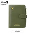 Dark green RFID passport holder with gold airplane icon and secure snap closure - Green