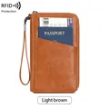 Portefeuille passeport RFID en cuir marron clair avec texture litchi et dragonne - Brun Clair