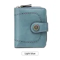 Portefeuille court vintage bleu clair pour femme avec design ajouré et boucle rétro - Rose bonbon