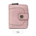 Petit portefeuille rose pour femme en cuir avec motifs ajourés et fermoir métallique - Rose