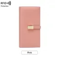 Slim pink RFID blocking wallet for women featuring a minimalist leather fold and gold buckle - Pink