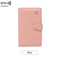 Pink RFID blocking travel passport wallet made of litchi grain faux leather with button - Pink