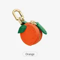 Mini orange fruit coin purse keychain with pebbled leather texture and gold metal clip - Orange