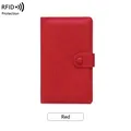Red RFID blocking passport holder in textured leather with snap closure and plane icon - Red