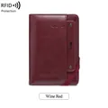 Wine red leather RFID passport holder featuring embossed airplane and shining star pattern - Burgundy