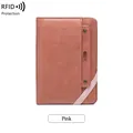 Pink RFID blocking leather passport cover with elastic band and embossed airplane logo - Pink