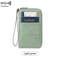 Light green RFID passport wallet with multi-functional pockets and wrist strap for travel - Light Green