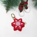 Mini monedero de cuero rojo con forma de copo de nieve y mosquetón dorado festivo - Copo de nieve
