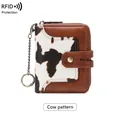 Short RFID wallet for women with brown leather and cow print faux fur with keychain - Cow Print