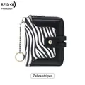 Short RFID blocking women wallet in black pebbled leather with zebra print and keychain - Zebra Print