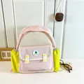 Pink and beige color-block kids backpack with yellow buttons and Good Luck patch - Pink Large