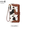 Portafoglio lungo da donna con blocco RFID, stampa mucca e pelle marrone a contrasto - Stampa mucca