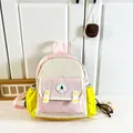 Kids color-block canvas backpack in cream and pink with a 'Good Luck' badge - Pink Small