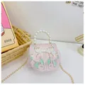Roze crossbodytas voor meisjes met bloemenborduurwerk en elegant parelhandvat - Roze